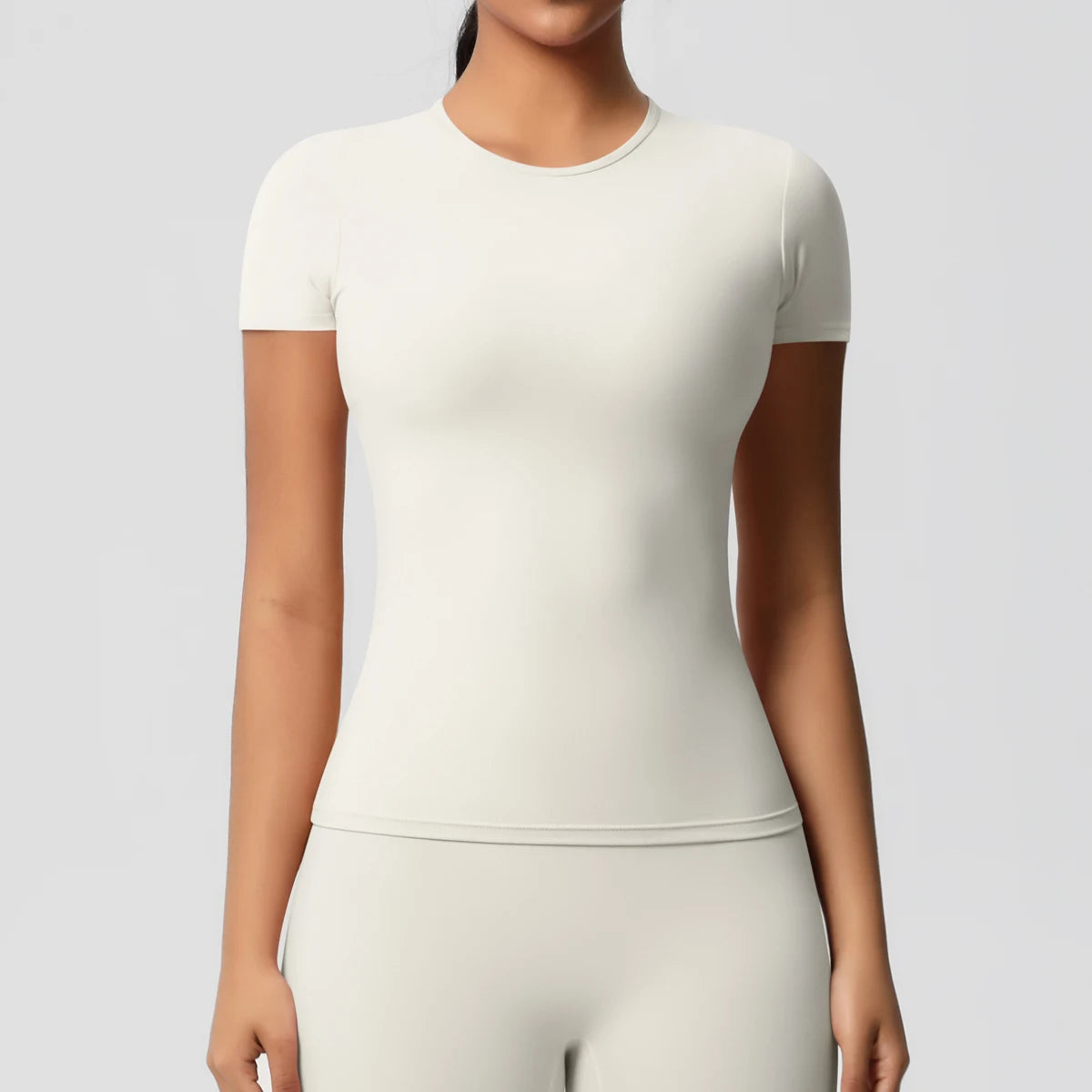 بلوزة رياضية نسائية مرنة وسريعة الجفاف