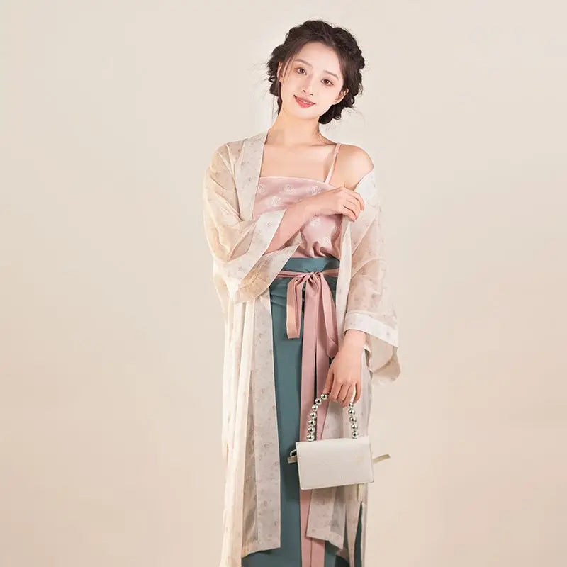 Women wearing Song Dynasty Hanfu three-piece outfit in soft colors, showcasing retro elegance and style.