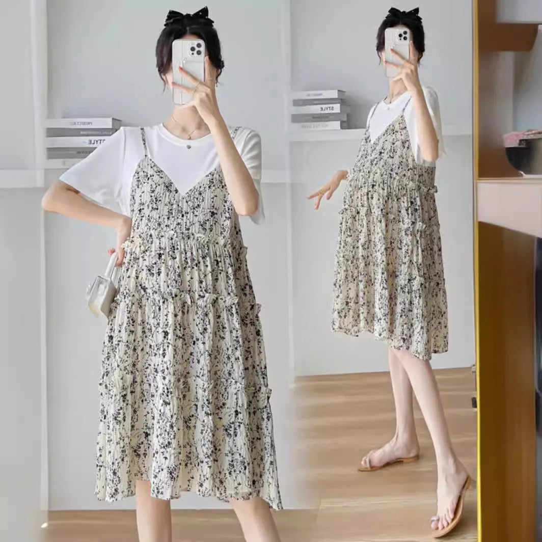 Elegant floral maternity dress featuring a knee-length design, perfect for baby showers and summer events.
