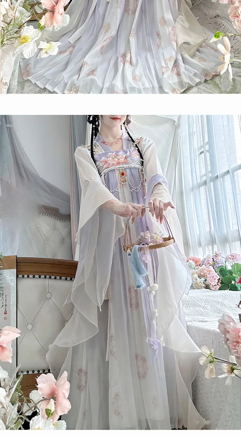 Elegant vintage Chinese Hanfu dress with floral patterns, flowing fabric, and traditional design.