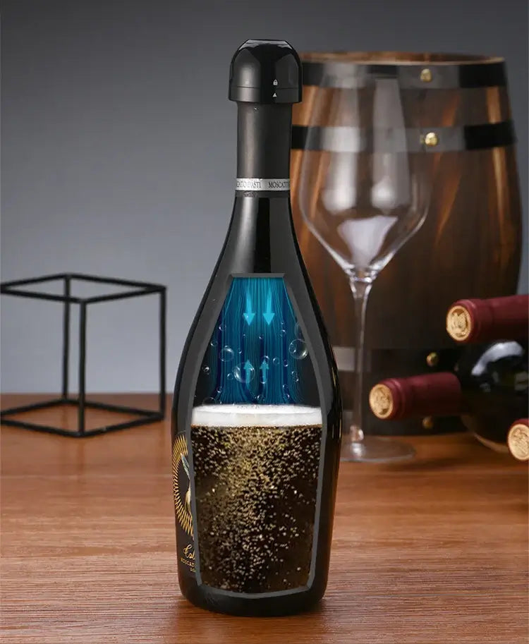 Red wine bottle with silicone cap stopper on a wooden table, featuring a stylish design with a glass and wine barrel in the background.