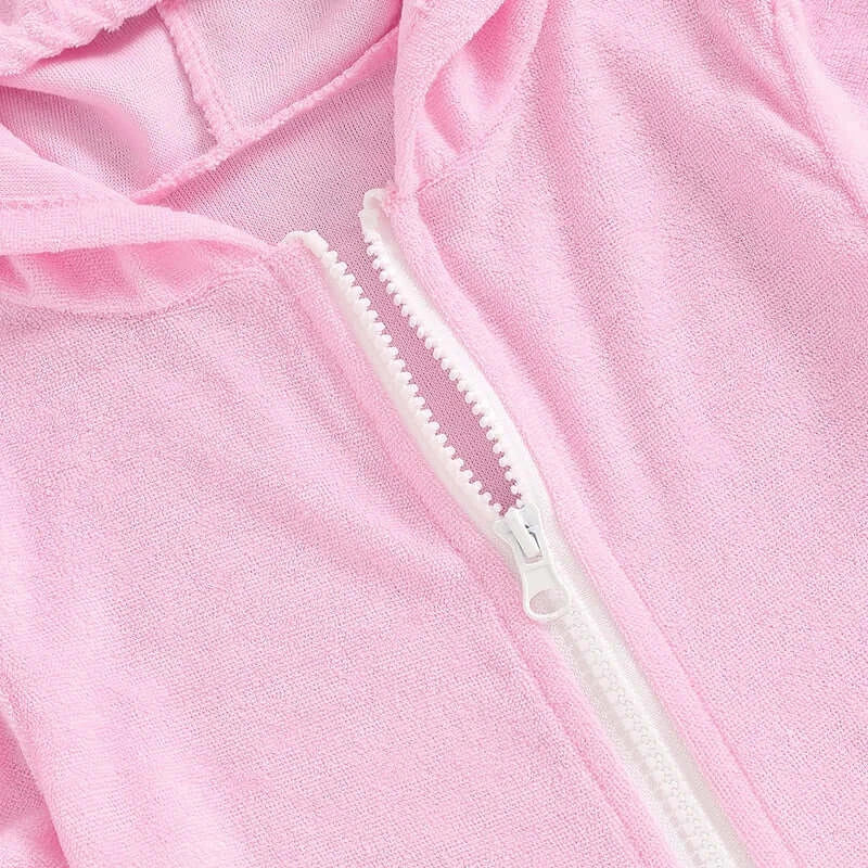 Close-up of pink toddler girls short sleeve zipper hooded dress, featuring a white zipper detail.