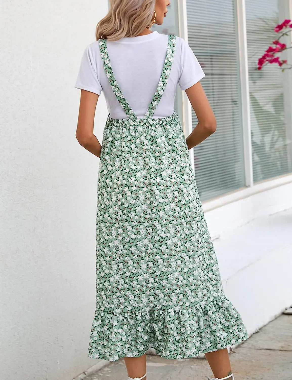 Back view of a comfortable floral maternity dress with a ruffled hem, perfect for spring and summer styles.