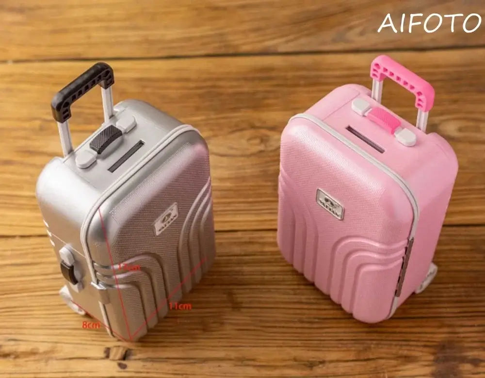 Two creative mini suitcases, one silver and one pink, showcasing their unique designs and child-friendly features.