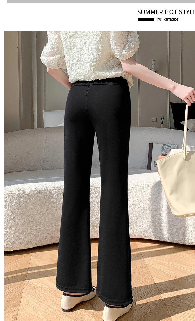 Black bootcut maternity pants made from ice silk, perfect for summer wear and stylish comfort.