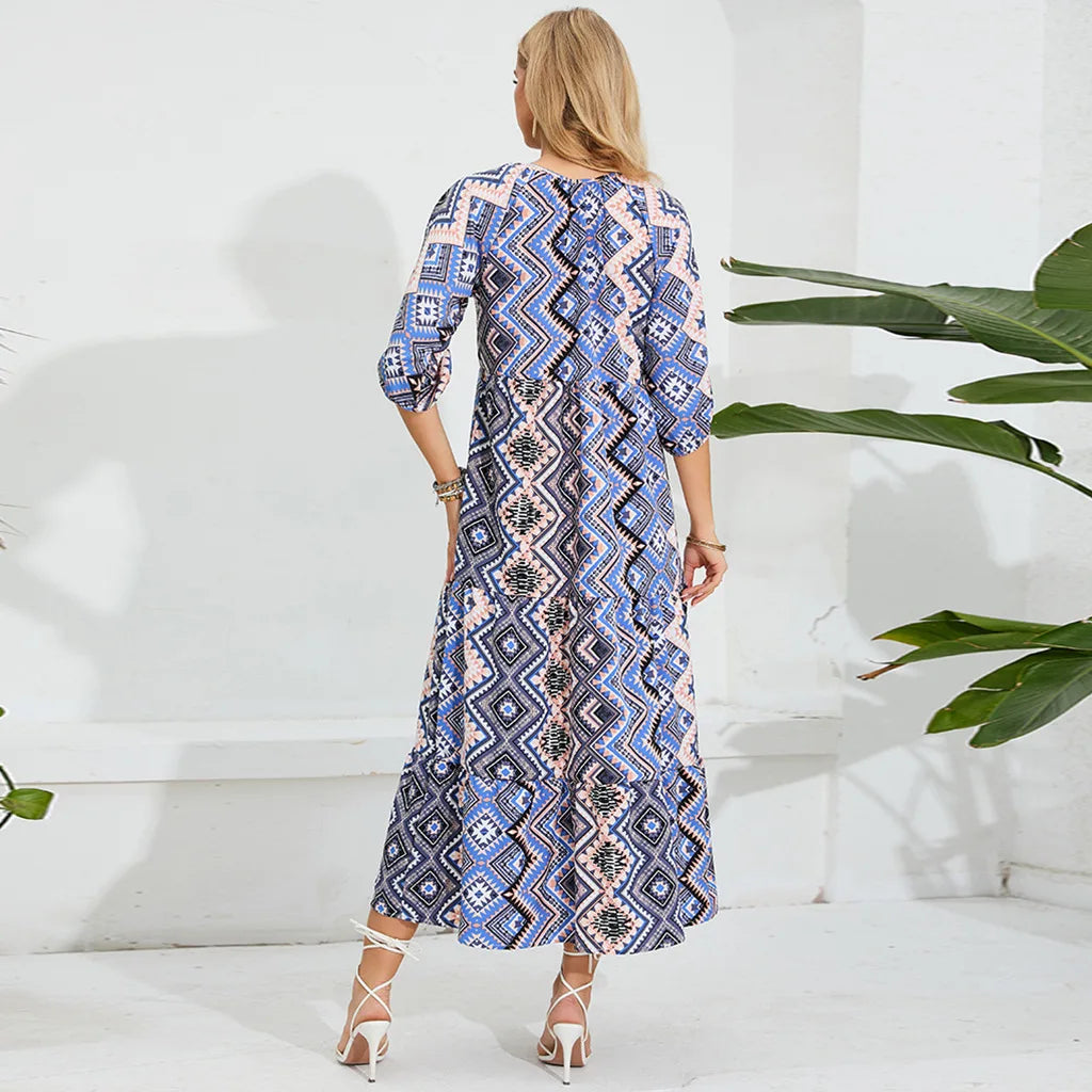 Elegant back view of a maternity beach dress with geometric patterns, ideal for summer photoshoots.