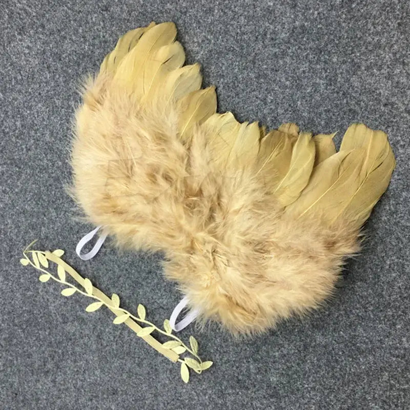 Baby angel wing photography prop set with headband for newborn photo shoots, unisex design, soft and feathery.
