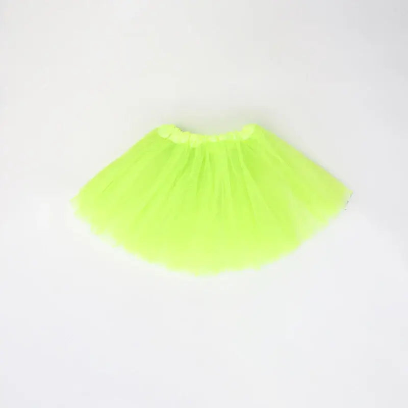Bright neon green tulle skirt for girls, perfect for parties and summer fun.