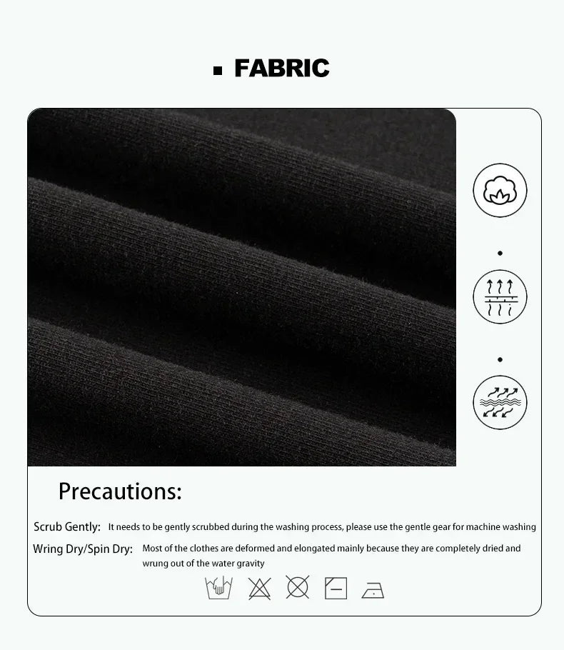 Close-up of fabric care instructions for a black garment, detailing washing and drying precautions.