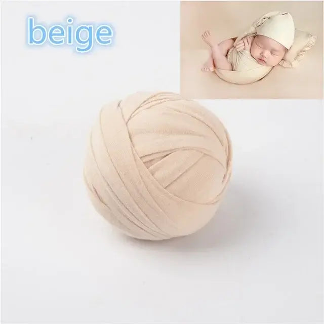 Beige baby blanket photo shoot backdrop with soft texture, perfect for newborn photography sessions.