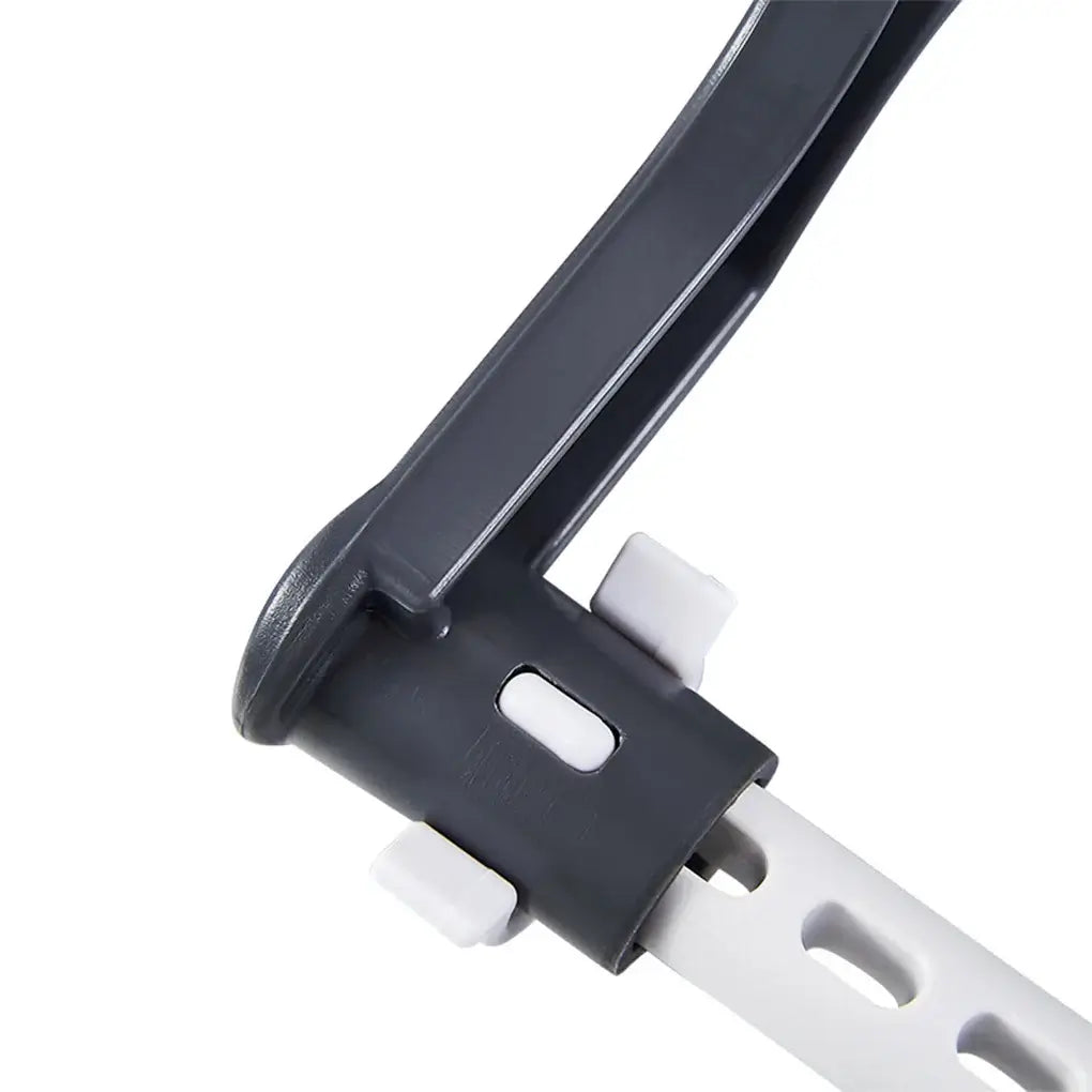 Detail of adjustable and foldable car safety seat buckle mechanism for children, showcasing easy-to-use design.