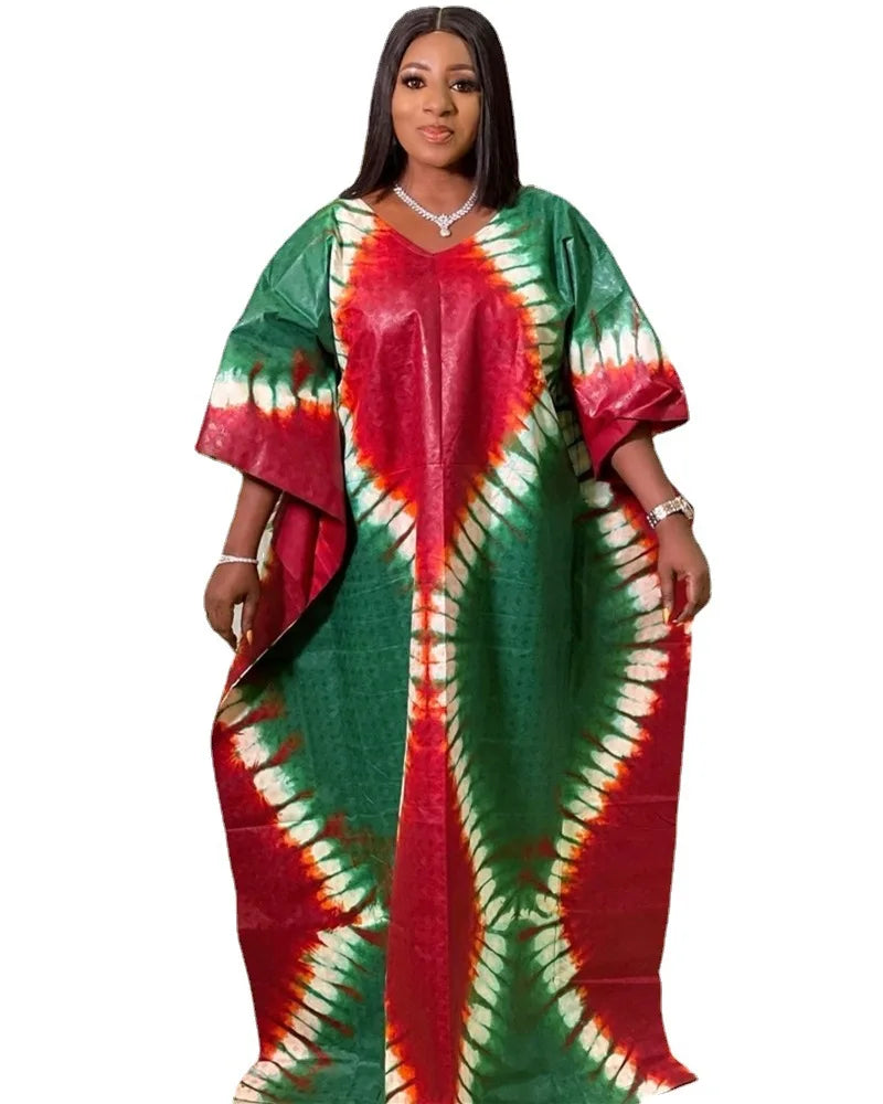African plus size printed long maxi dress in vibrant red and green colors, perfect for traditional wear and special occasions.