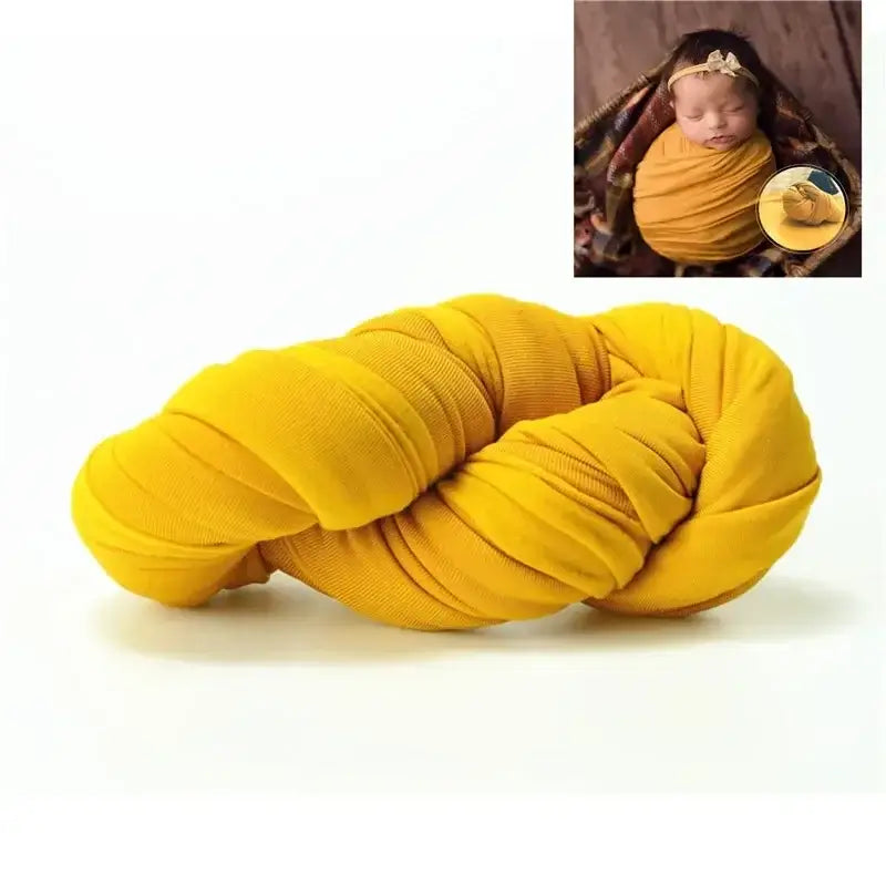 Solid yellow baby photography backdrop for newborn photo shoots, made from soft polyester fabric.