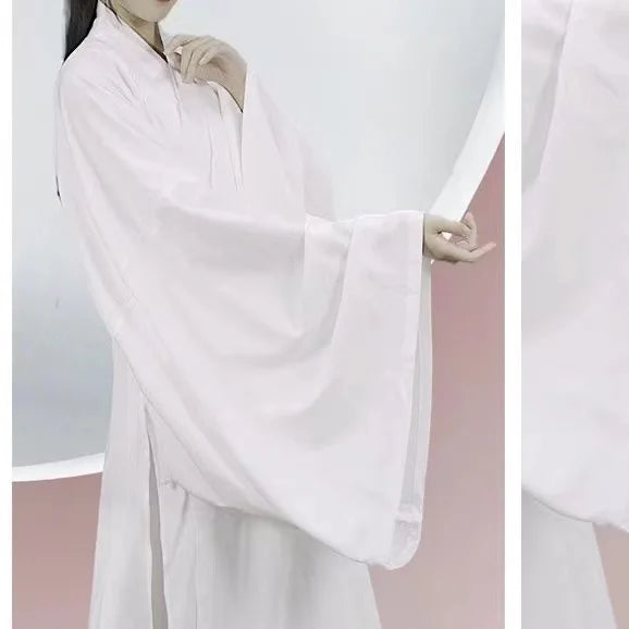 Ming Dynasty Hanfu inner robe costume in soft pink, featuring flowing sleeves and traditional design for men and women.