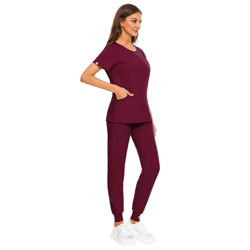 7-color nursing work uniform in burgundy, featuring zipper V-neck top and matching pants, designed for women and unisex use.