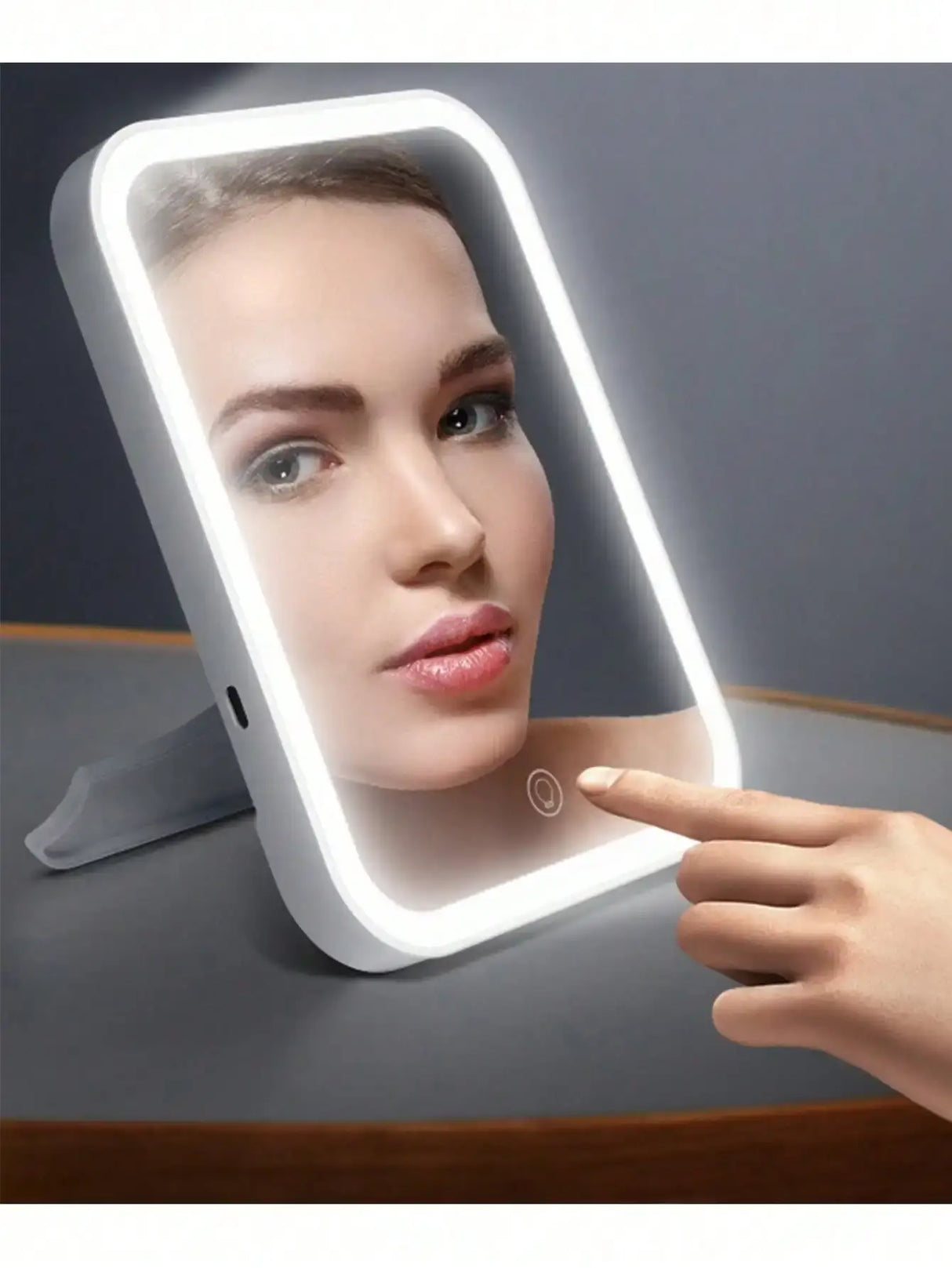LED makeup mirror with adjustable dimming, featuring a touch sensor and a sleek design for easy storage.