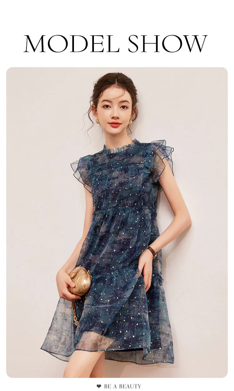 Model showcasing LOUIS YAO Sparkling Dress with flounced edge and patchwork design, perfect for summer.