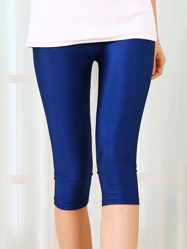 بنطال ليجنز نسائي من سباندكس لامع بلون النيون