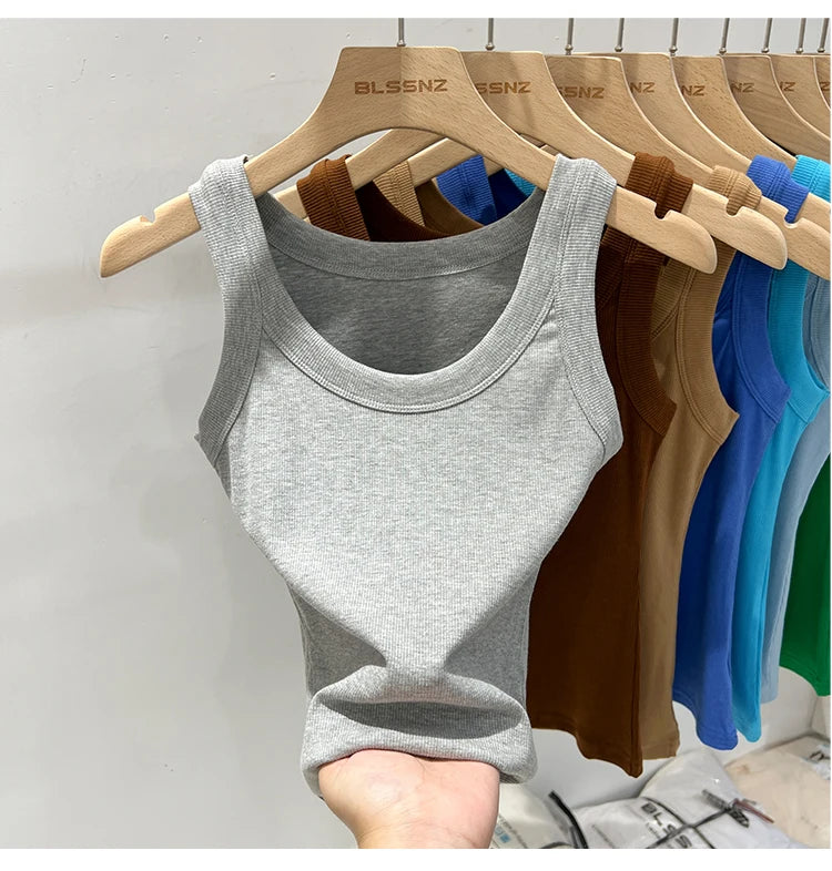 Gray RibFlex™ basic O-neck tank top held by a hand, showcasing summer ribbed comfort style.