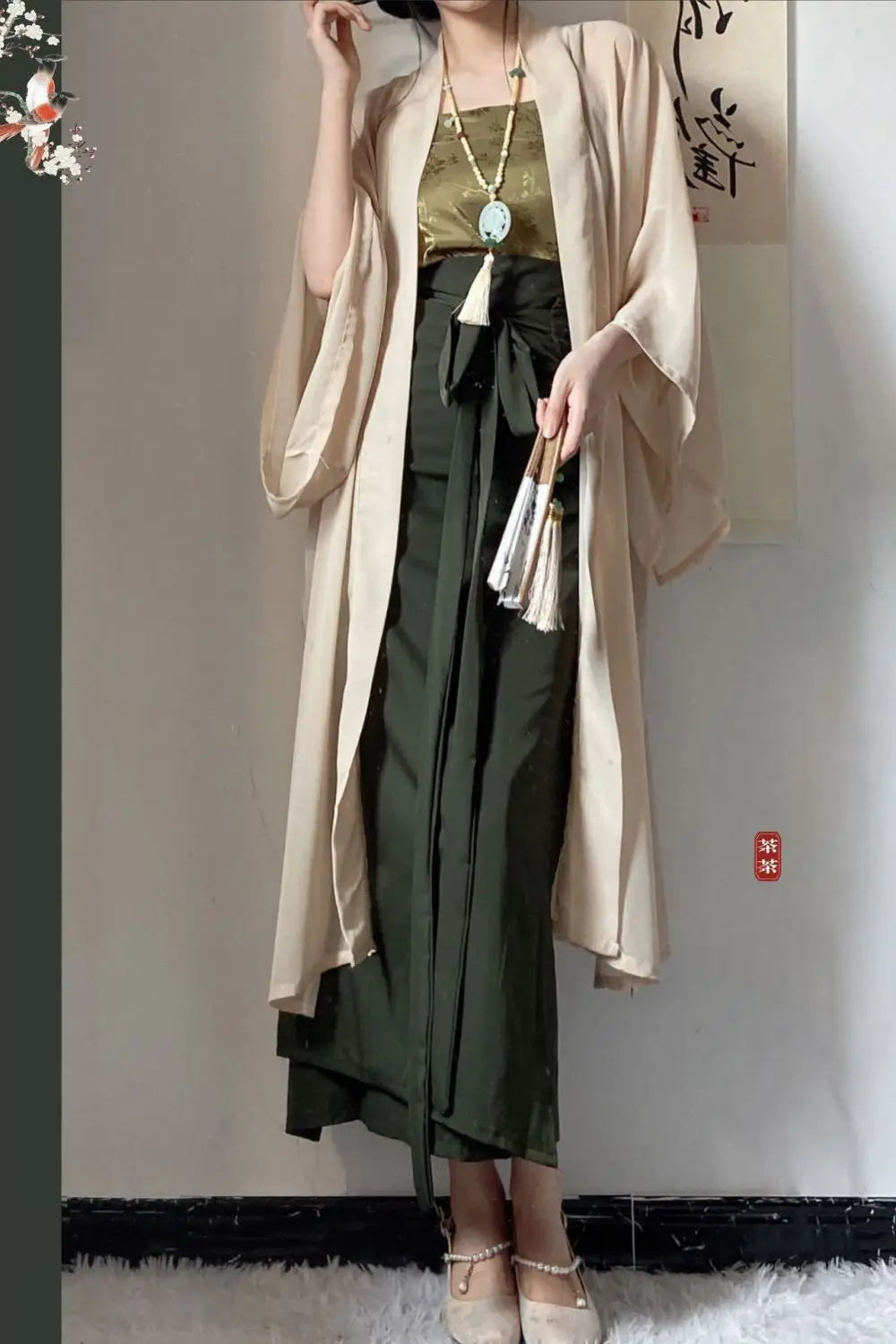 Woman wearing a Princess Song Dynasty Hanfu 3-piece robe in beige and green, showcasing elegant traditional style.