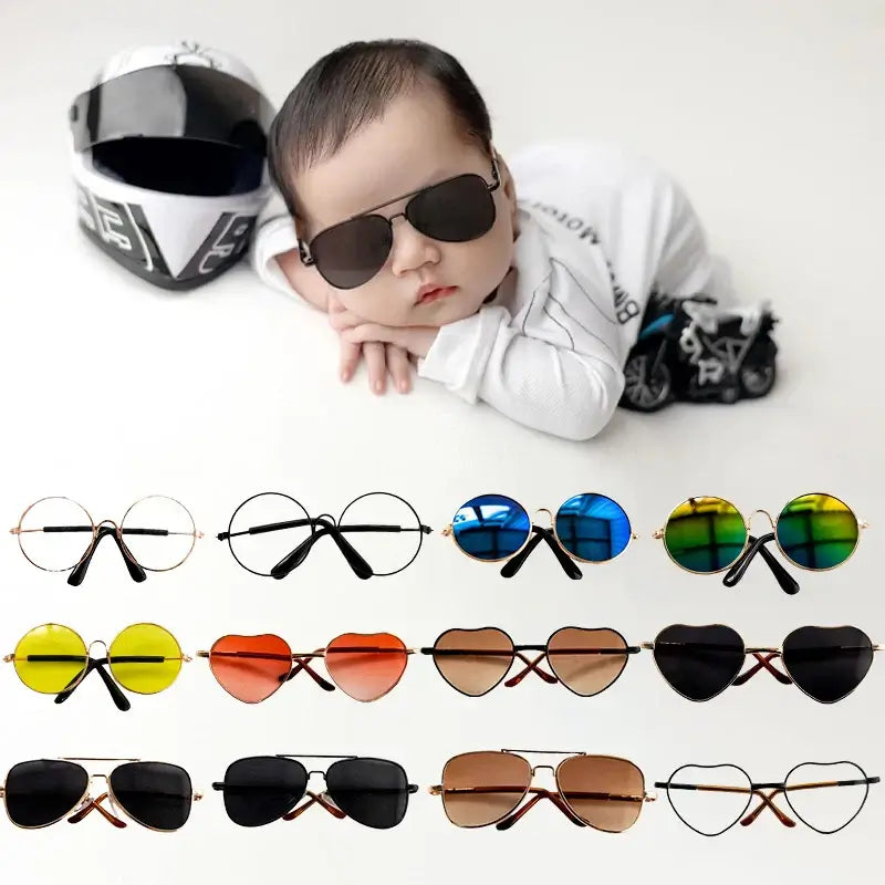 Baby wearing stylish sunglasses with various colorful options for newborn photography accessories.