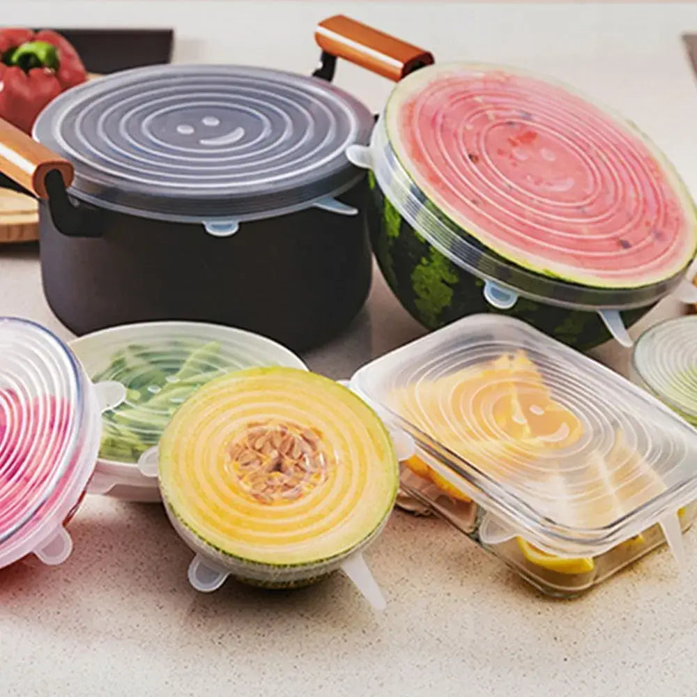 Set of 6 silicone stretch lids fitting various bowls and pots in kitchen, perfect for food storage and microwave use.