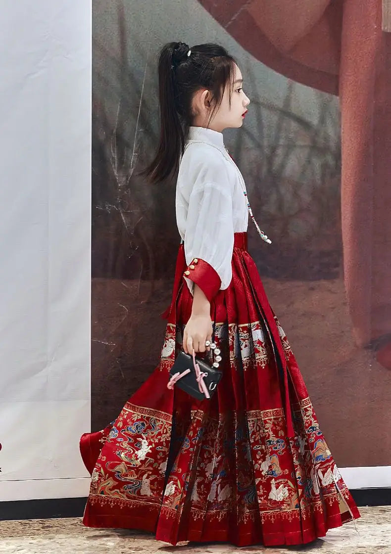 Little girl wearing a stunning embroidered summer hanfu dress, showcasing elegance and cultural style in bright red and white.