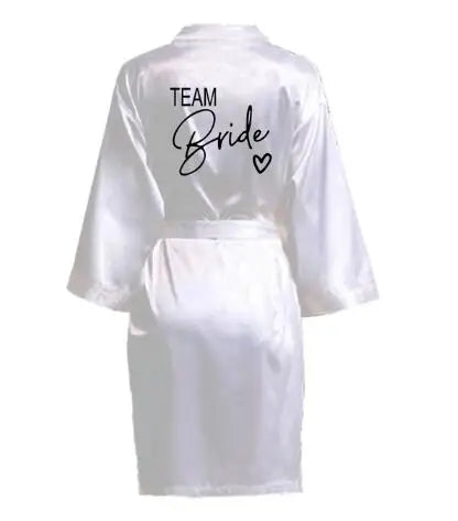White satin robe with 'TEAM Bride' text on the back, perfect for bridal parties.