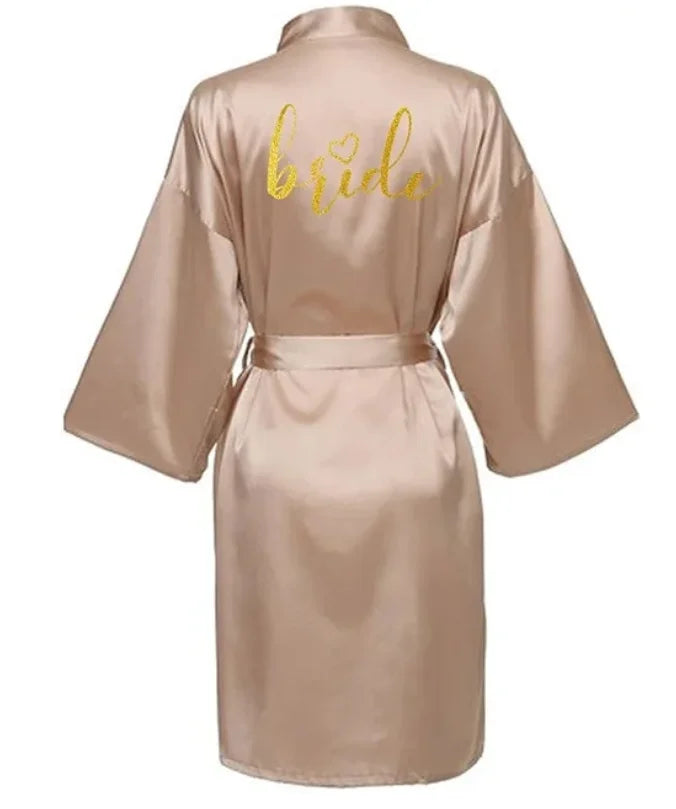 Back view of gold letter satin bride robe, knee-length kimono pajamas for women, stylish silk blend fabric.