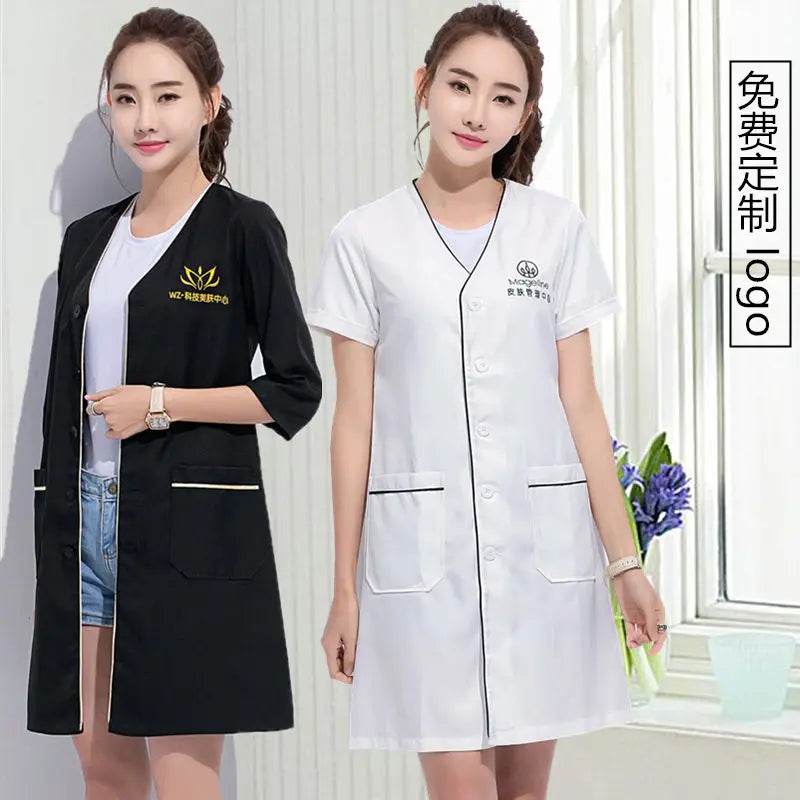 Custom logo beauty uniforms for women, short sleeve lab coats in black and white, ideal for salons and medical use.