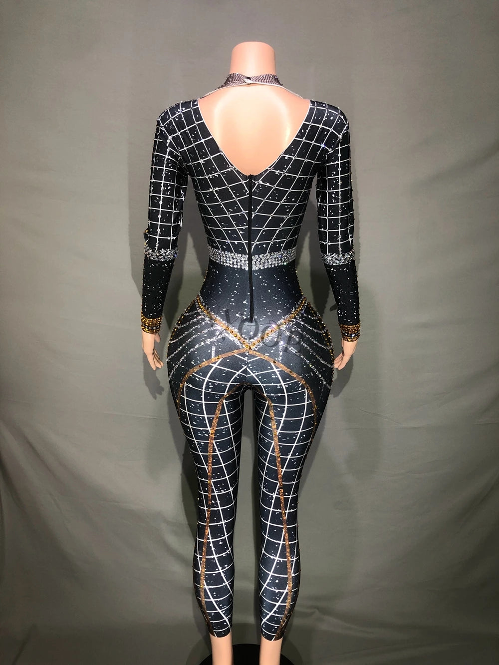 Back view of a stylish rhinestone jumpsuit, perfect for stage outfits, designed for female dancers and performers.