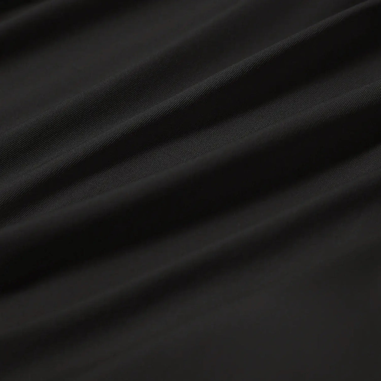 بلوزة يوغا نسائية مفتوحة الظهر بأكمام طويلة