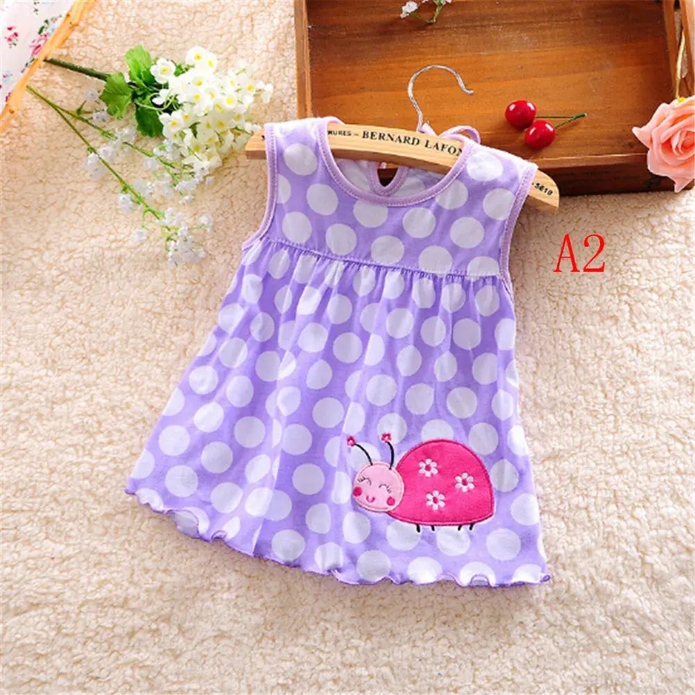 Sleeveless cotton dress for baby girls, purple with polka dots and snail design, suitable for newborns and toddlers.