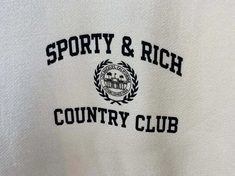 سويت شيرت نسائي بطبعة حروف عتيقة برقبة دائرية