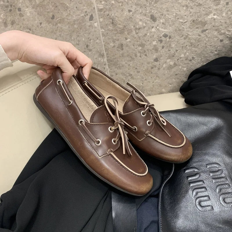 أحذية نسائية بدون كعب - حذاء مسطح برباط من الجلد الطبيعي 2025