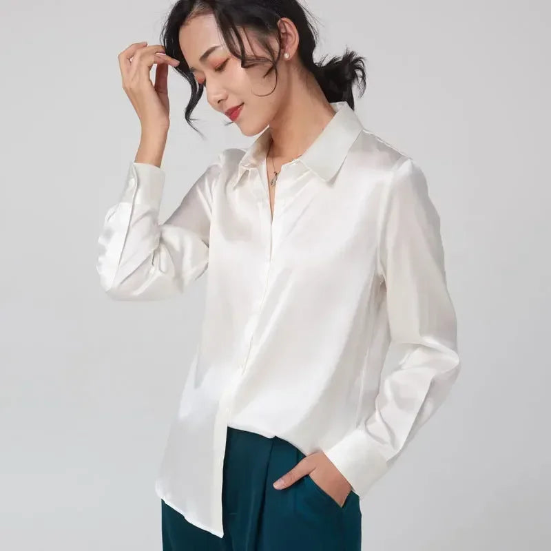 SatinGrace™ long sleeve silk shirt in luxurious white, showcasing a chic V-neck and relaxed fit for women.