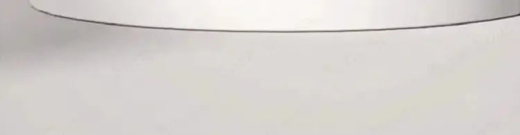 Minimalistic round tabletop with a smooth finish, ideal for modern interiors.