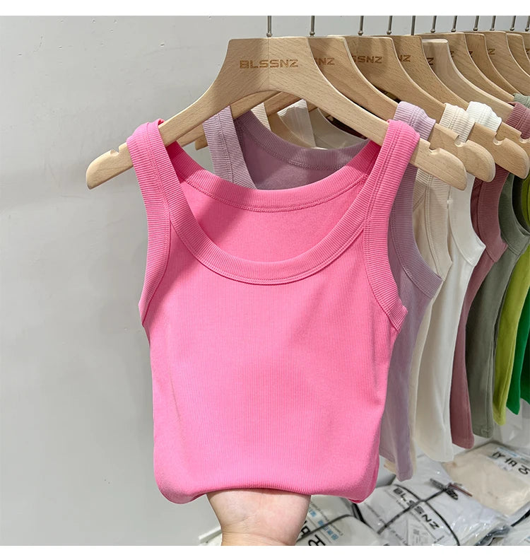 RibFlex™ Basic O-Neck Tank in pink, showcasing summer style and comfort with ribbed texture and stretchy fabric.