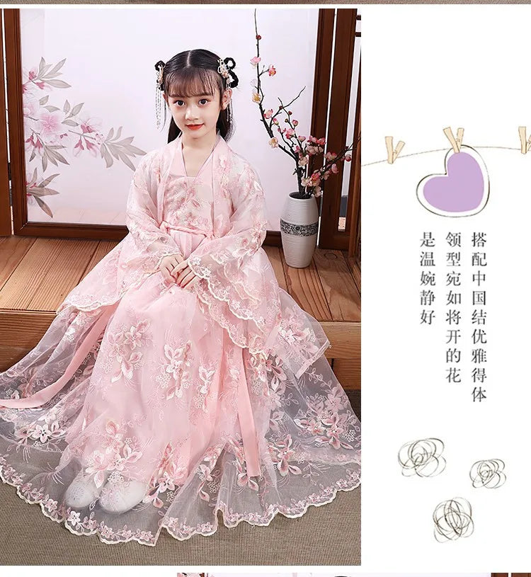 Modern fairy hanfu dress for girls, featuring delicate pink floral design and elegant flowing fabric.