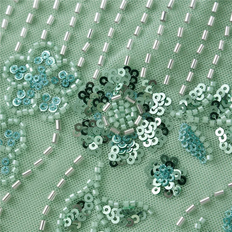 بلوزة نسائية بدون أكمام ذات ترتر عميق على شكل حرف V