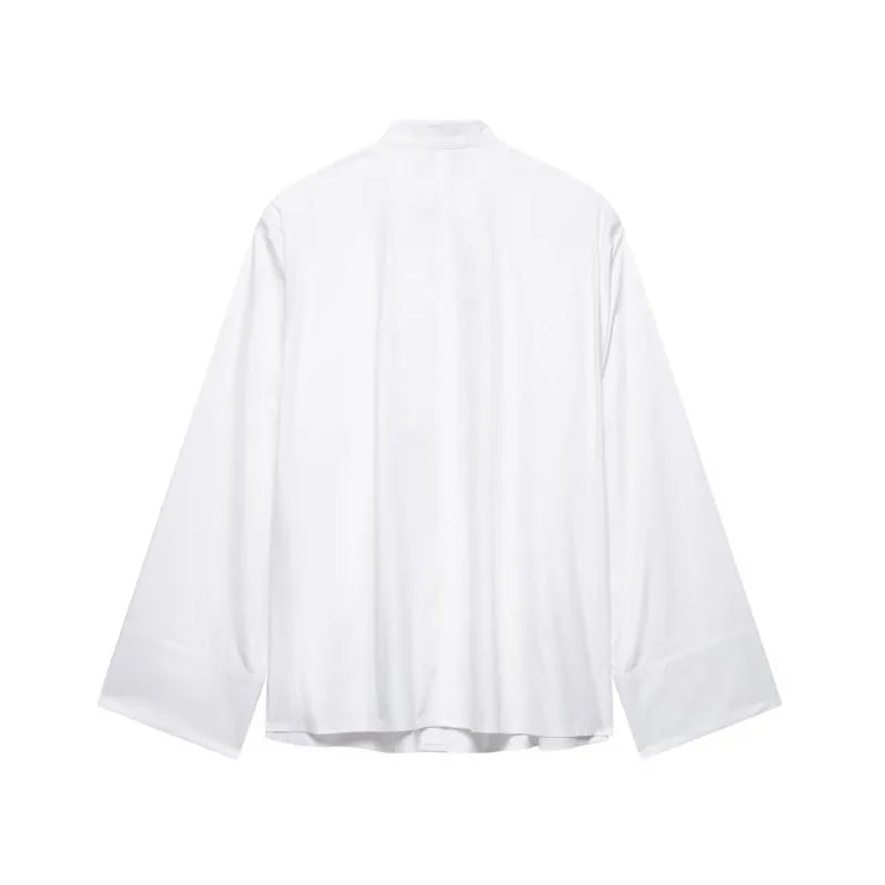 Back view of the EmbroiChic™ Elegant Embroidery Shirt, a casual long sleeve blouse in white.
