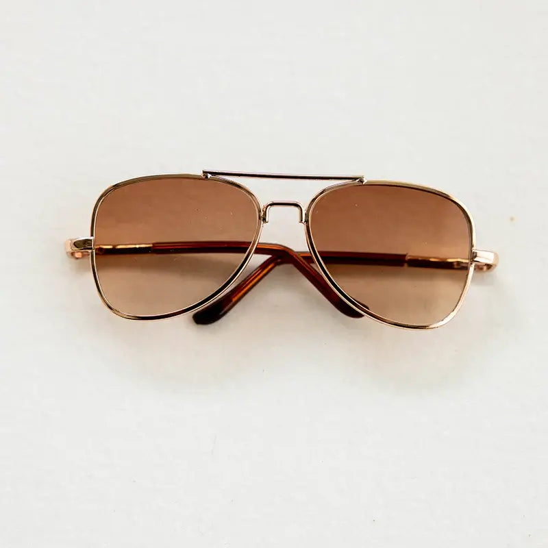 Round and heart-shaped baby glasses for newborn photography accessories in colorful design.