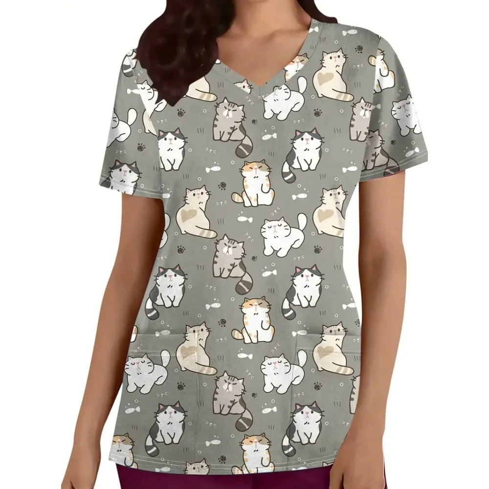 Women's short sleeve vet scrubs featuring a playful cartoon cat print in soft, breathable fabric.