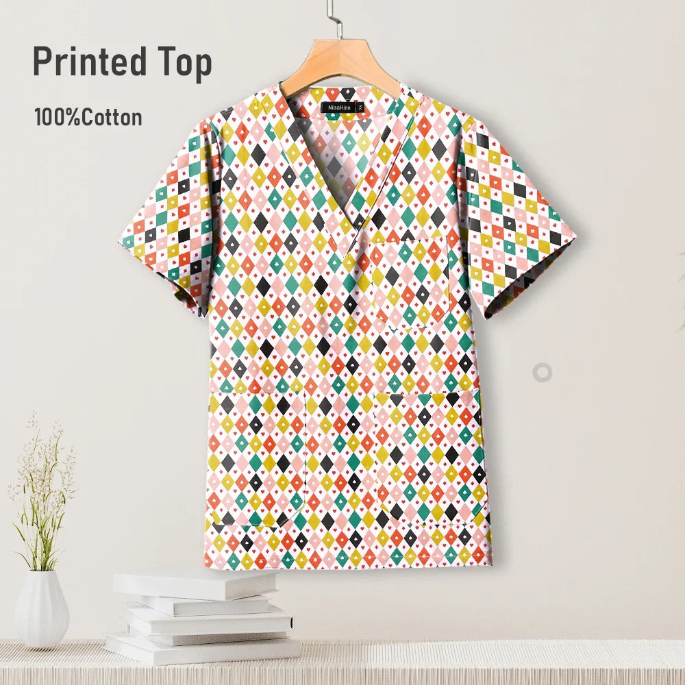 Colorful printed hospital scrub top made of 100% cotton, featuring a V-neck design and pockets for nurses.