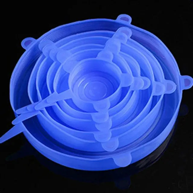 6 Pcs Silicone Stretch Lids in blue, perfect for covering kitchen bowls and using in the microwave.