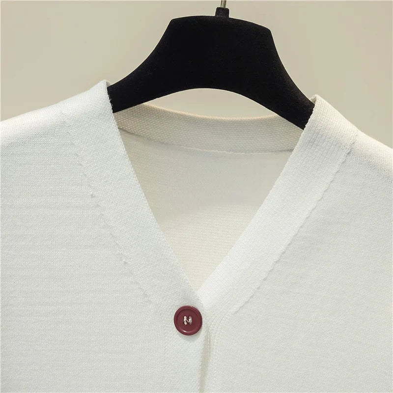 سترة نسائية محبوكة بأكمام قصيرة