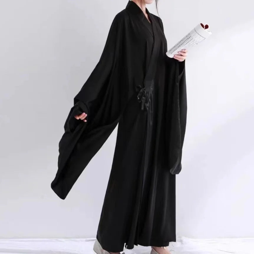 Ming Dynasty Hanfu inner robe costume in black, featuring flowing sleeves and traditional Chinese design, ideal for men and women.