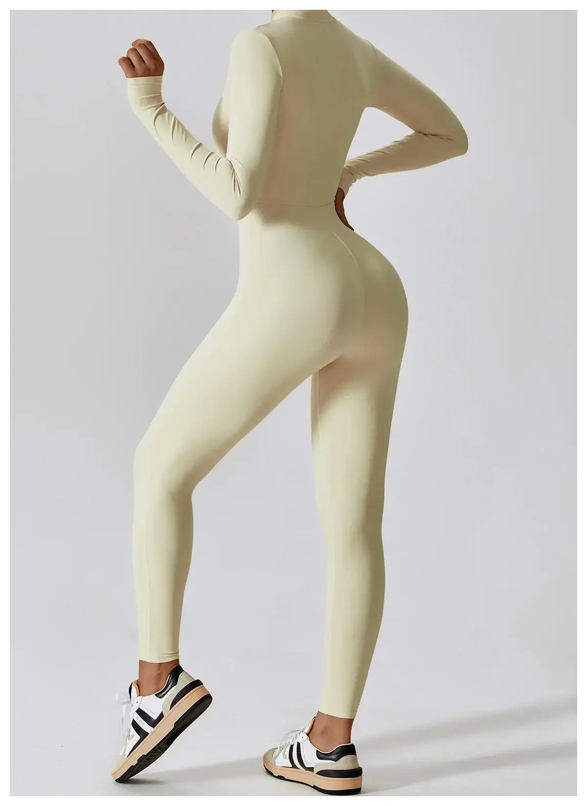 جمبسوت رياضي نسائي بأكمام طويلة وسحاب