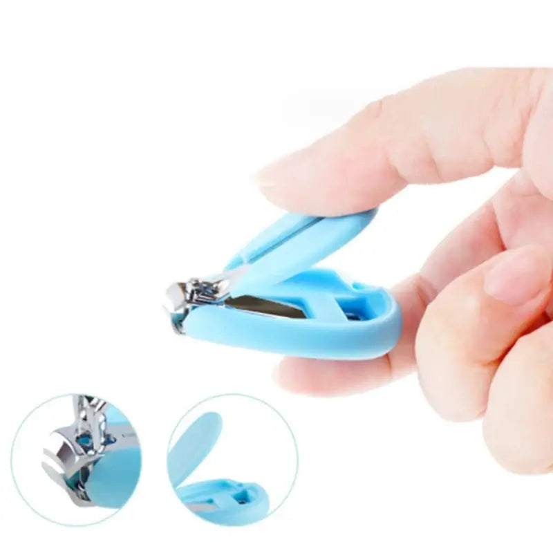 Close-up of a blue newborn baby nail scissor, designed for safe trimming of infant nails.