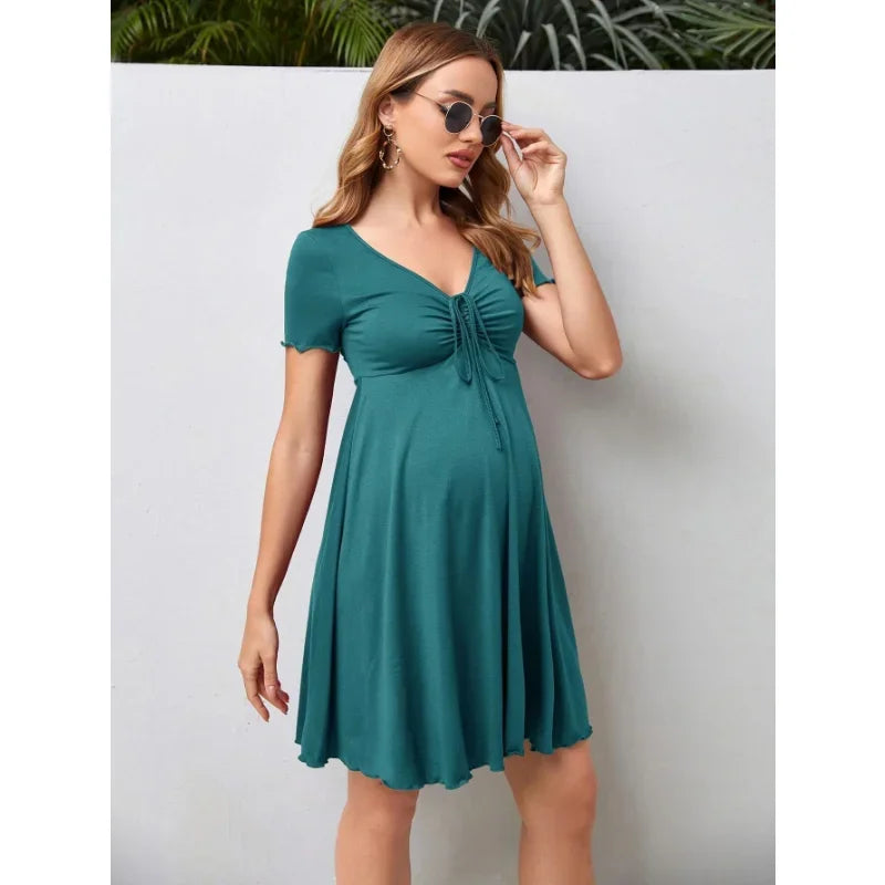 Pure Color V-Neck Maternity Dress in teal, perfect for summer. Short sleeves and knee-length fit for plus size comfort.